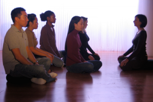 People doing yoga together