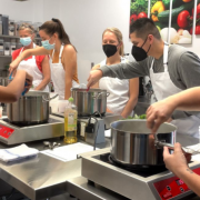 people cooking in a cooking class