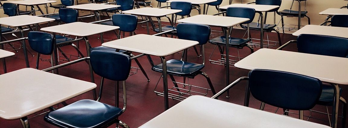 Empty classroom with chairs and tables