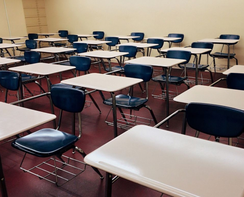 Empty classroom with chairs and tables