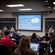 students presenting a mental health powerpoint