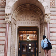 A student going into Powell library