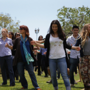 Group of people dancing outside on the courtyard