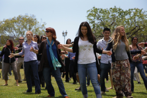 Group of people dancing outside on the courtyard