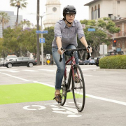 a woman riding a bike in westwood