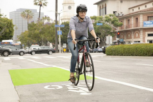 a woman riding a bike in westwood