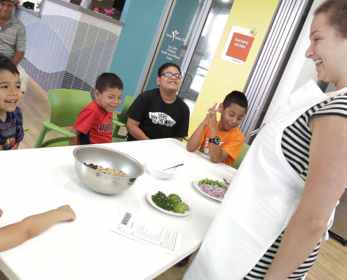 Claudia Varney teaching kids how to cook