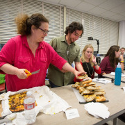 Evan Kleiman's students take a break from serious discussions about food issues to enjoy a focaccia pizza she made. Sharing food and recipes is an essential part of the course.