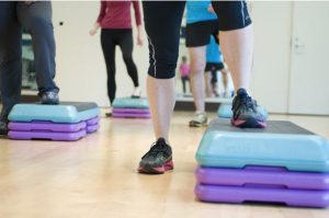 People exercising at the gym