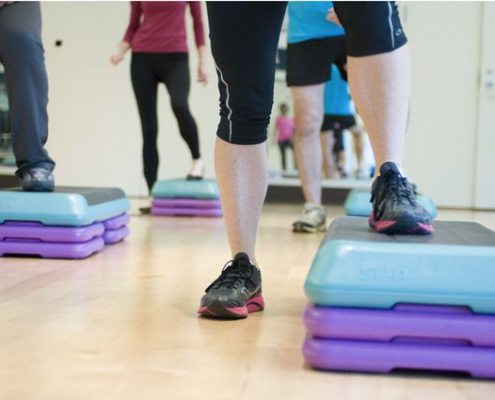 People exercising at the gym