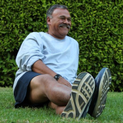 Frank Lopez sitting on grass