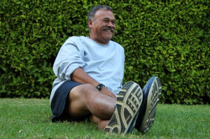 Frank Lopez sitting on grass