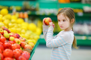 Girl holding an apple