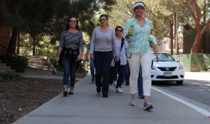 A group of women walking on UCLA campus