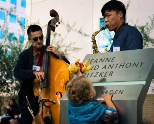 2 guys playing music in front of the UCLA medical center