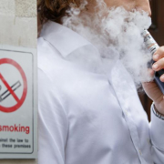 someone vaping in front of a no smoking sign