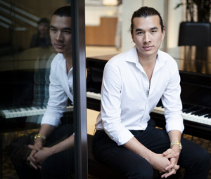 Fourth-year economics student Jeremy Barrett has worked since May 2017 to get public pianos installed on campus. He said he hopes they will foster a sense of community. (Joe Akira/Daily Bruin staff)