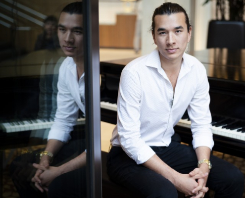 Fourth-year economics student Jeremy Barrett has worked since May 2017 to get public pianos installed on campus. He said he hopes they will foster a sense of community. (Joe Akira/Daily Bruin staff)