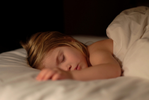 girl sleep in her bed