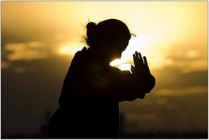 woman meditating in the morning