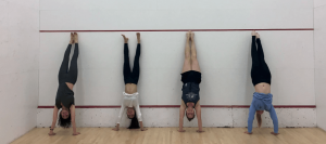 student doing a headstand